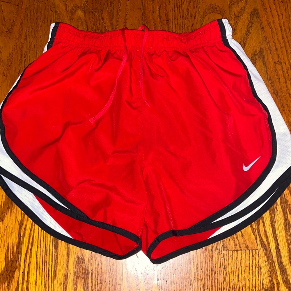 Red Nike shorts